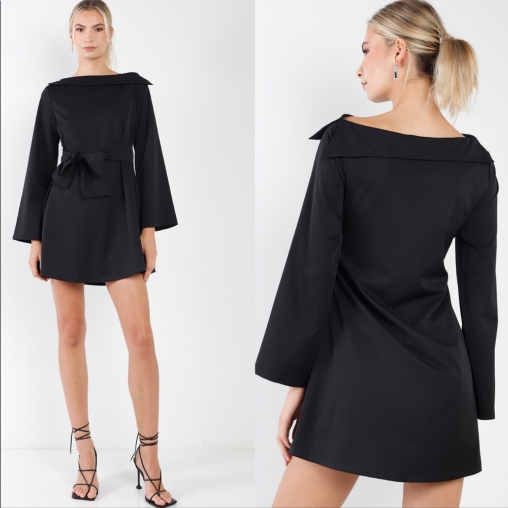 Brand new. 3 for $25 Elegant black front tie long sleeve mini dress